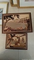 Both wooden inlay art panels displayed together, showing scale and design details.