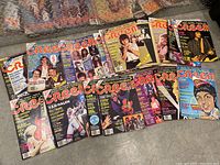 Layout of Cream rock magazines featuring various classic rock artists on the cover
