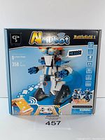 Full front view of the Almubot Battlefield 1 robot building set box showing robot model and branding.