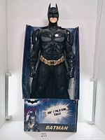 Full view of the 30 inch Batman action figure standing in box, showing front with armor details and box design.