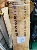 Box packaging showing Growrite branding and lot sticker indicating lot 1.