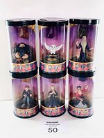 Set of 6 Harry Potter mini figurines in cylindrical packaging arranged in two rows