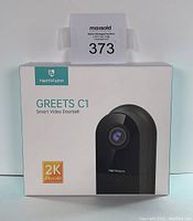 Front view of box showing Heimvision Greets C1 smart video doorbell with 2K Ultra HD branding.