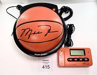 Photo of complete Michael Jordan basketball phone with base and handset, including power cables