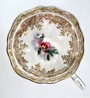 Top view photo of the Paragon cup showing floral design and gold ornamental detailing inside the cup.
