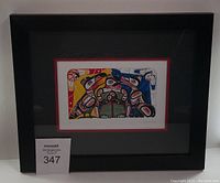 Full image of the framed artwork showing the entire piece, matting, and frame.