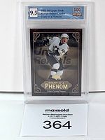 Front view of the 2005-06 Upper Deck Sidney Crosby Diary of a Phenom card graded 9.5 by GCG encased in a plastic slab.
