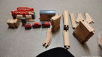 Complete lot laid out showing tracks, train cars, bridge, tunnel, and crates.