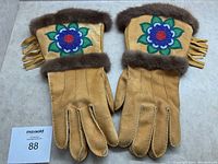 Full pair of gloves laid flat front side up