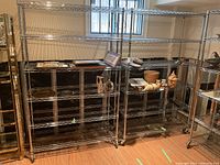 Front view of both assembled shelving units with decorative items displayed