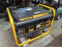 Front view showing control panel, outlets, model number and brand on housing