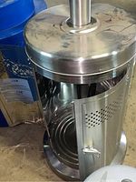 Open base housing showing internal space for propane cylinder