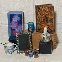 Full lot including fiber optic lamp, hand-painted vases, a ceramic cup, a photo frame with bead decoration, a book box, small candle holders, and a painted ceramic bottle