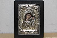 Front view of the Byzantine icon mounted on wood with detailed sterling silver overlay featuring Virgin Mary and Child Jesus.