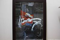 Full view of framed poster showing abstract surreal artwork by Salvador Dali.