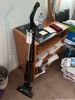 Full view of Bissell Magic Vac upright vacuum showing the handle, body, and cleaning head.