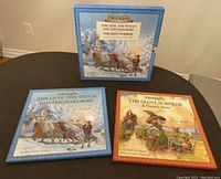 Box set and individual books The Lion, The Witch and The Wardrobe and The Giant Surprise shown on a table.