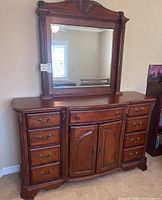 Full view of dresser and mirror showing overall design and condition