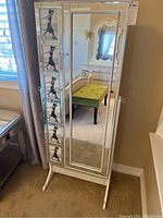 Front view of full-length cheval jewelry armoire