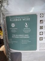 Photo of one pillow's label showing Martha Stewart Collection Allergy Wise hypoallergenic label details