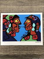 Full frontal view of the limited edition print showing two stylized profiles against blue background