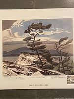 Full view of the art print showing a landscape with white pine tree and background mountains, including text and artist signature.