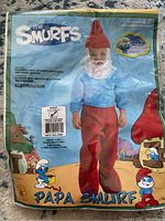 Packaged Papa Smurf infant costume, showing front of packaging with costume image and branding