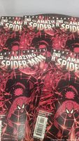 Five identical copies of The Amazing Spider-Man issue #42 comic book showing cover art and details including barcode, credit to writers and artists.