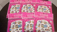 Six unopened identical sticker packs featuring Mickey and Minnie Mouse characters with pink header packaging.