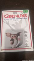 Front cover of the Gremlins Special Edition DVD showing Gizmo and the title with a shadowy gremlin figure in the background.