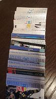 Stack of approximately 50+ Upper Deck Special Edition hockey cards stacked showing the reflective silver and colorful card edges.