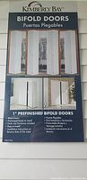 Photo of Kimberly Bay bifold doors packaging label with product details and features.
