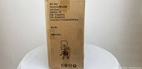 Cardboard packaging box indicating SKU IF032, black color office chair, weight and carton dimensions.