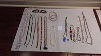 Full assortment of necklaces and bracelets laid out