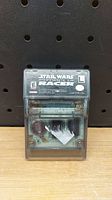 Front view of Star Wars Episode 1 Racer Game Boy cartridge with rumble feature and label.