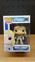 Front view of boxed Funko Pop! White Canary figure showing character and branding details