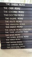 Stack of 17 hardcover books with titles naming various American Indian tribes, part of the Indian Tribal Series.