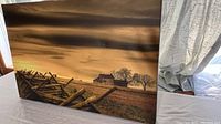 Full view of the oil painting on canvas showing farmhouse, fence, and field under cloudy skies.