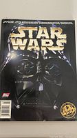 Front cover of Star Wars 20th Anniversary Commemorative Magazine showing a close-up of Darth Vader's helmet and official 20th Anniversary logo.