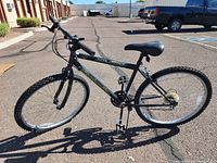 Profile view of the black Rockridge mountain bike showing frame, tires, saddle, and handlebar grips