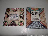 Covers of two quilt books showing colorful quilt patterns and titles.