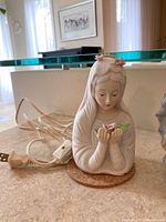 Illuminated angel figurine showing front detail with cord and switch included