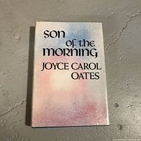 Book cover of 'Son of the Morning' by Joyce Carol Oates. Shows the dust jacket with faded pastel coloring and title text.