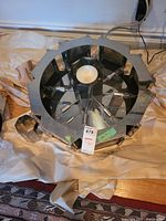 Top view showing circular chrome frame and central bulb sockets.