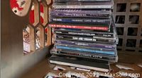 Stack of various music CDs with visible titles including 'Grand Funk Railroad', 'Flashback Best Of', 'Best of Classic Rock', and others, showing the lot contents.