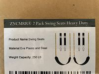 Close-up of product information label listing material as EVA plastic and steel, weight capacity of 250 lb, and product name.