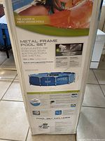 Box showing the Intex Metal Frame Pool Set with specifications and assembly information.
