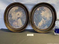 Photo of both vintage oval frames side by side showing full images and ornate wood frame