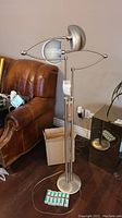 Full view of floor lamp and bulb pack on hardwood floor