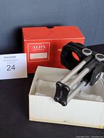 Alpa Dovex macro bellows displayed inside original white foam-lined box, with red Alpa Reflex box behind.